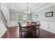 Dining room featuring hardwood floors, chair rail, and lots of light at 1840 Brighton Se Blvd, Atlanta, GA 30316