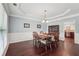 Dining room features hardwood floors, chair rail, and view into the kitchen at 1840 Brighton Se Blvd, Atlanta, GA 30316