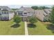Attractive two-story home with a well-maintained lawn, sidewalk and mature trees, providing nice shade at 1840 Brighton Se Blvd, Atlanta, GA 30316