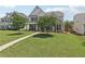 Charming two-story home with well-manicured lawn, mature trees, and inviting front porch at 1840 Brighton Se Blvd, Atlanta, GA 30316
