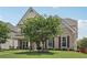 Attractive home with well-maintained lawn, complemented by lush landscaping and brick accents at 1840 Brighton Se Blvd, Atlanta, GA 30316