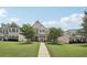 Inviting two-story home with manicured front lawn, brick accents, and charming curb appeal at 1840 Brighton Se Blvd, Atlanta, GA 30316