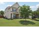Stylish home with a well-kept lawn and inviting front porch, perfect for relaxing outdoors at 1840 Brighton Se Blvd, Atlanta, GA 30316