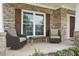 Relaxing front porch with cozy seating, perfect for enjoying the outdoors in comfort and style at 1840 Brighton Se Blvd, Atlanta, GA 30316