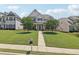Charming home with a well-maintained lawn, walkway, and manicured landscaping at 1840 Brighton Se Blvd, Atlanta, GA 30316