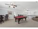 This game room offers a pool table, multiple seating options, and plenty of space at 1840 Brighton Se Blvd, Atlanta, GA 30316