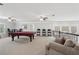 This game room features a pool table, a lounge area, and ample seating at 1840 Brighton Se Blvd, Atlanta, GA 30316