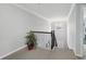This hallway features an elegant staircase and neutral colored walls at 1840 Brighton Se Blvd, Atlanta, GA 30316