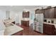 Bright kitchen with stainless steel appliances, dark cabinetry, and granite countertops at 1840 Brighton Se Blvd, Atlanta, GA 30316