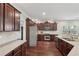 Spacious kitchen with stainless steel appliances, dark cabinets, and light countertops and open floor plan at 1840 Brighton Se Blvd, Atlanta, GA 30316