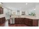Modern kitchen featuring stainless steel appliances, dark wood cabinetry, and a stylish backsplash at 1840 Brighton Se Blvd, Atlanta, GA 30316