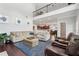 Open living room featuring a railing, comfortable seating and an open floorplan at 1840 Brighton Se Blvd, Atlanta, GA 30316