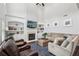 Vaulted living room featuring fireplace, built-in bookshelves and comfortable seating at 1840 Brighton Se Blvd, Atlanta, GA 30316
