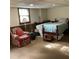 Bedroom space showcasing cozy carpet, paneling, and a full bed for a comfortable retreat at 2700 Regency E Dr, Tucker, GA 30084
