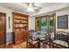 Cozy breakfast nook featuring wood floors, large windows with a view, and built-in cabinet at 2700 Regency E Dr, Tucker, GA 30084