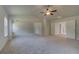 Spacious bedroom with plush carpet, large windows, and an open layout for comfortable living at 68 Homesite Cooper W Cv, Fayetteville, GA 30214