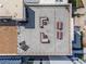 Aerial view showcasing the rooftop lounge area with modern outdoor seating and dining at 1421 Peachtree Ne St # 214, Atlanta, GA 30309