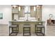 Modern kitchen island with marble countertop and seating for three at 2318 Polar Rock Terrace, Atlanta, GA 30315