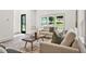 Bright living space with modern decor, large windows and light wood style flooring at 2318 Polar Rock Terrace, Atlanta, GA 30315