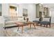 Open living area with stylish furniture, modern decor, and a glimpse into the kitchen at 2318 Polar Rock Terrace, Atlanta, GA 30315