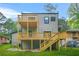Rear of the home showcasing a two-story deck, providing ample space for relaxation and outdoor activities at 2318 Polar Rock Terrace, Atlanta, GA 30315