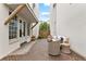 Charming backyard patio with brick pavers and seating, perfect for outdoor living at 110 3Rd St, Fayetteville, GA 30214