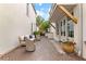 Cozy backyard patio with a charming seating area surrounded by greenery at 110 3Rd St, Fayetteville, GA 30214