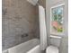 Bathroom with neutral tile shower and natural light at 110 3Rd St, Fayetteville, GA 30214