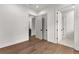 Bedroom showcases wood floors and multiple doorways at 110 3Rd St, Fayetteville, GA 30214