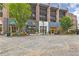 Charming commercial building featuring diverse storefronts, brick accents and inviting entrances at 110 3Rd St, Fayetteville, GA 30214