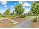 Scenic walkway with beautiful landscaping, perfect for enjoying the outdoors at 110 3Rd St, Fayetteville, GA 30214