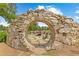 Picturesque common area with stone archway and outdoor seating at 110 3Rd St, Fayetteville, GA 30214