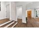 Inviting entryway with hardwood floors, leading to a bright, open living space at 110 3Rd St, Fayetteville, GA 30214