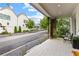 Inviting front porch with outdoor seating, decorative plants, and a clear view of the street, creating a welcoming entrance at 110 3Rd St, Fayetteville, GA 30214
