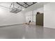Spacious garage with painted flooring and overhead storage system installed at 110 3Rd St, Fayetteville, GA 30214