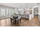 Expansive kitchen and dining area featuring stainless steel appliances and french doors to the patio at 110 3Rd St, Fayetteville, GA 30214