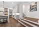 Open floor plan with kitchen, mudroom, and staircase features a stylish design at 110 3Rd St, Fayetteville, GA 30214