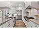Gourmet kitchen boasts stainless appliances, custom cabinetry, and large island at 110 3Rd St, Fayetteville, GA 30214