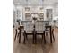 Modern kitchen with a large island, stainless steel appliances, and dining area at 110 3Rd St, Fayetteville, GA 30214
