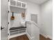 Mudroom with bench, shelving, coat hooks, and entry to the house at 110 3Rd St, Fayetteville, GA 30214