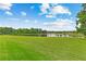 Picturesque view of a serene pond surrounded by lush greenery at 110 3Rd St, Fayetteville, GA 30214