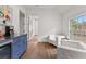 Sitting area with wet bar, beverage fridge, and modern decor at 110 3Rd St, Fayetteville, GA 30214