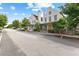 Picturesque street view featuring a row of well-maintained homes with lush landscaping and a tranquil, suburban setting at 110 3Rd St, Fayetteville, GA 30214
