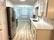 Bright kitchen with stainless steel appliances, updated countertops, and a breakfast nook at 1255 Summit Point Ln, Snellville, GA 30078