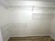 Walk-in closet with built-in wire shelving, offering ample storage and organization space at 1255 Summit Point Ln, Snellville, GA 30078