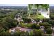 Aerial view of home in a wooded suburban neighborhood at 2759 Beddington Way, Suwanee, GA 30024