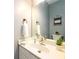 Bright powder room with neutral paint and decor at 2759 Beddington Way, Suwanee, GA 30024
