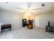 Spacious bonus room with ceiling fan and carpeted floors at 2759 Beddington Way, Suwanee, GA 30024