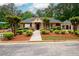 Well-maintained community building with manicured landscaping and a welcoming entrance at 2759 Beddington Way, Suwanee, GA 30024