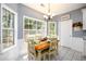 Bright dining area with natural light and charming decor at 2759 Beddington Way, Suwanee, GA 30024